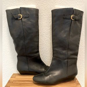 Black leather knee high flat heeled boots with gold detail